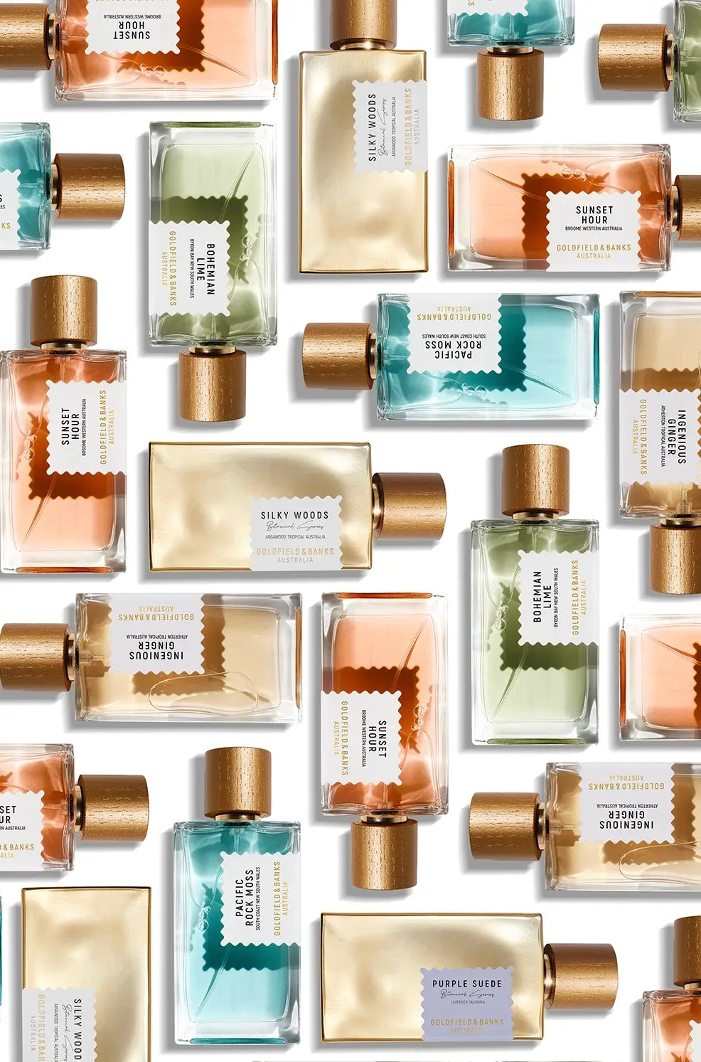 Goldfield & Banks Australia luxury fragrance bottles featuring Sunset Hour, Pacific Rock Moss, Ingenious Ginger, Bohemian Lime, Silky Woods and Purple Suede arranged on a white background.
